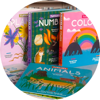An photo of colorful Takelma primer board books, plants, numbers, colors, 